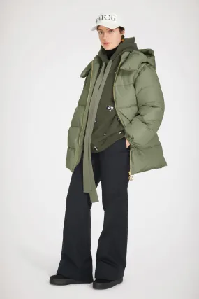 Puffer coat with detachable sleeves in recycled polyester