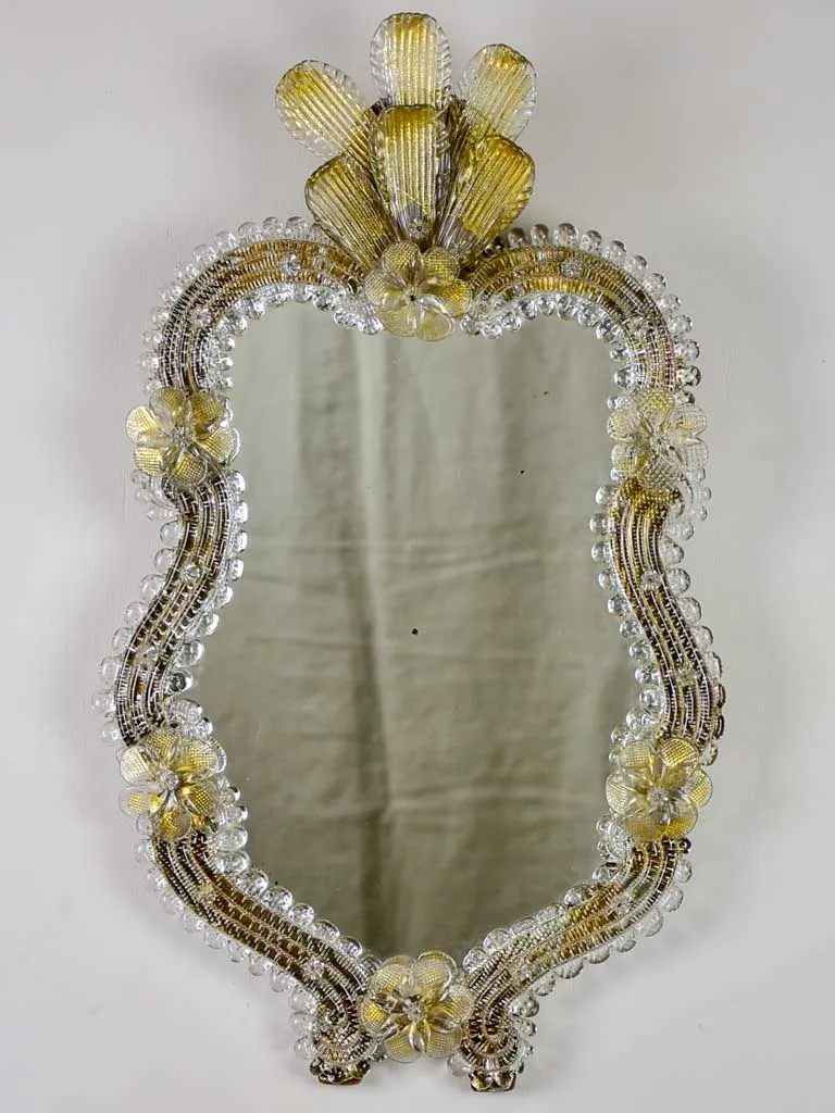 Vintage Venetian style mirror with gold leaves and flowers